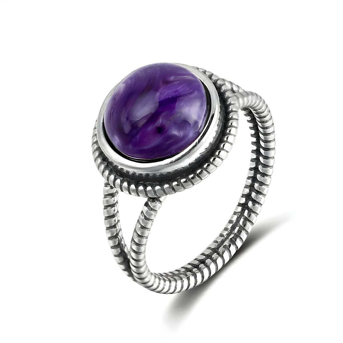 bague améthyste argent avec pierre cabochon ovale violette montée sur anneau torsadé en argent au design vintage