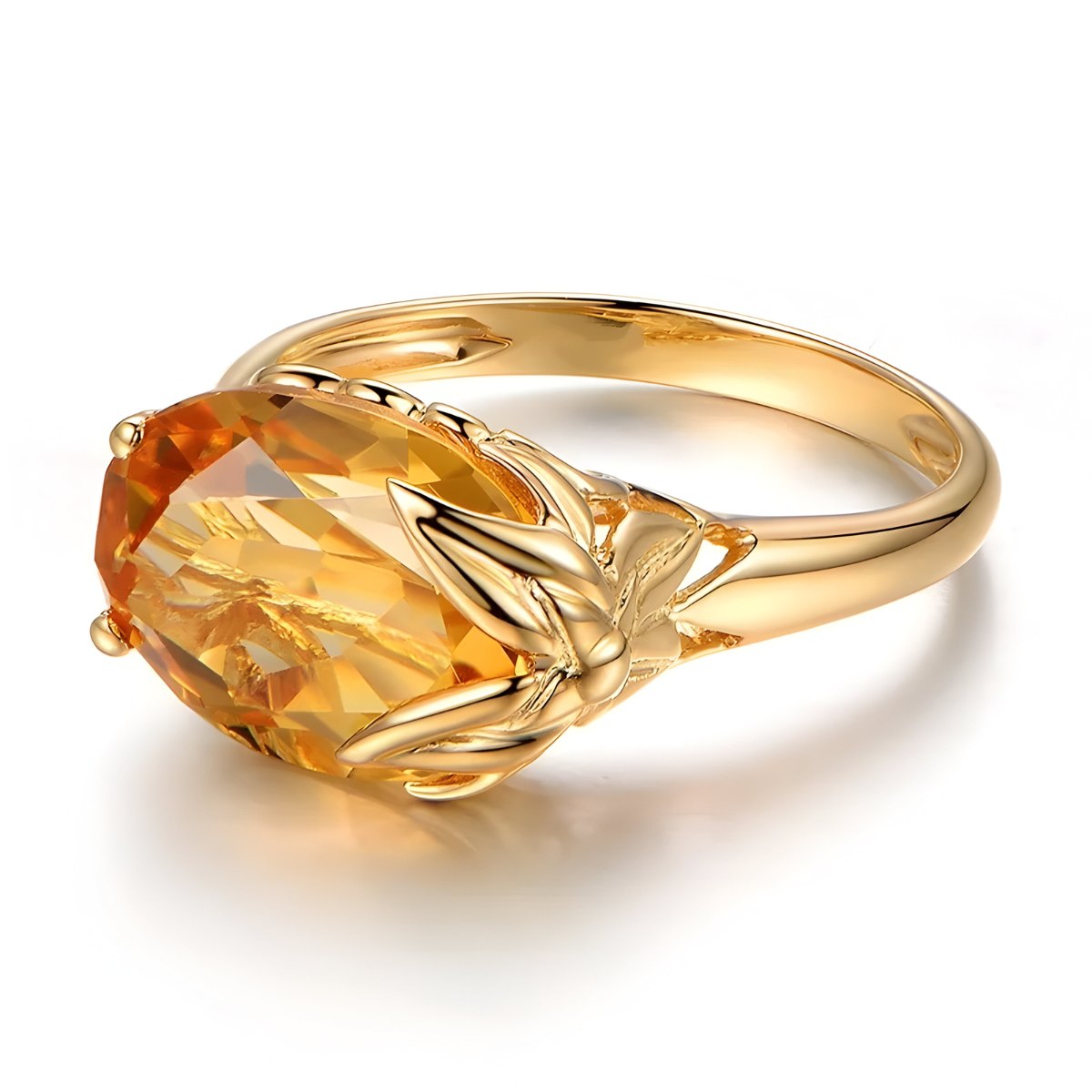 bague citrine ovale en or avec motif floral griffé