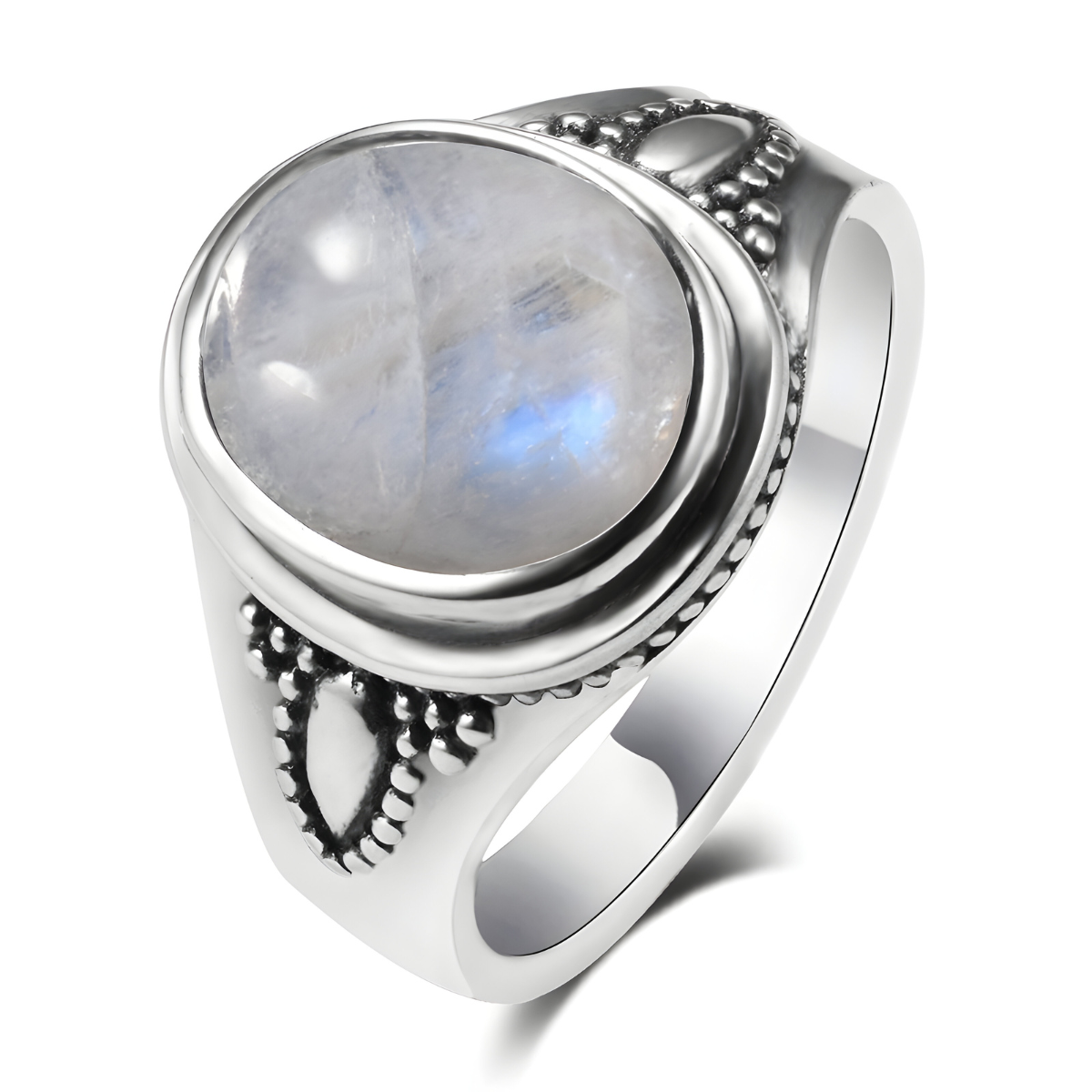 Bague pierre de lune lithothérapie ovale cabochon montée sur anneau argenté avec détails perlés et motif en goutte de chaque côté