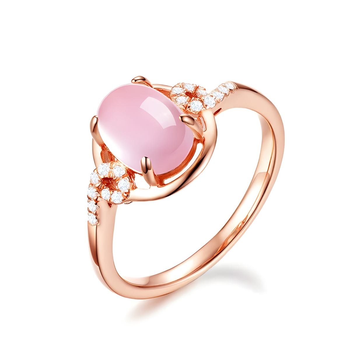 Bague quartz rose or ovale cabochon montée sur anneau doré rose décoré de petits oxydes blancs en forme de boucle