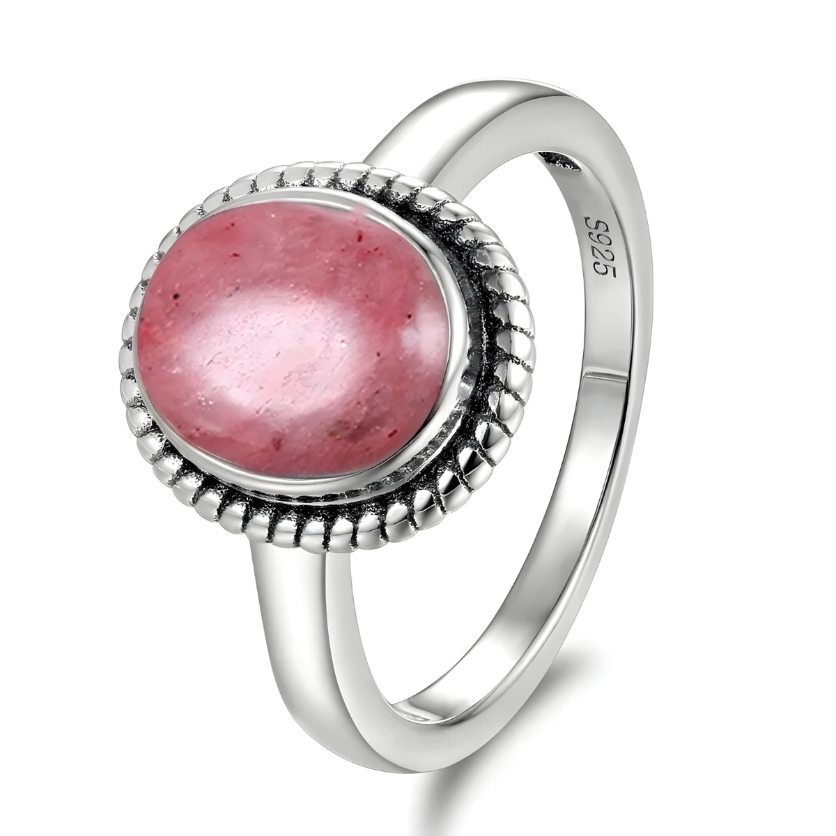 Bague rhodochrosite ronde rose sertie sur anneau argenté 925 avec bordure texturée en relief autour de la pierre