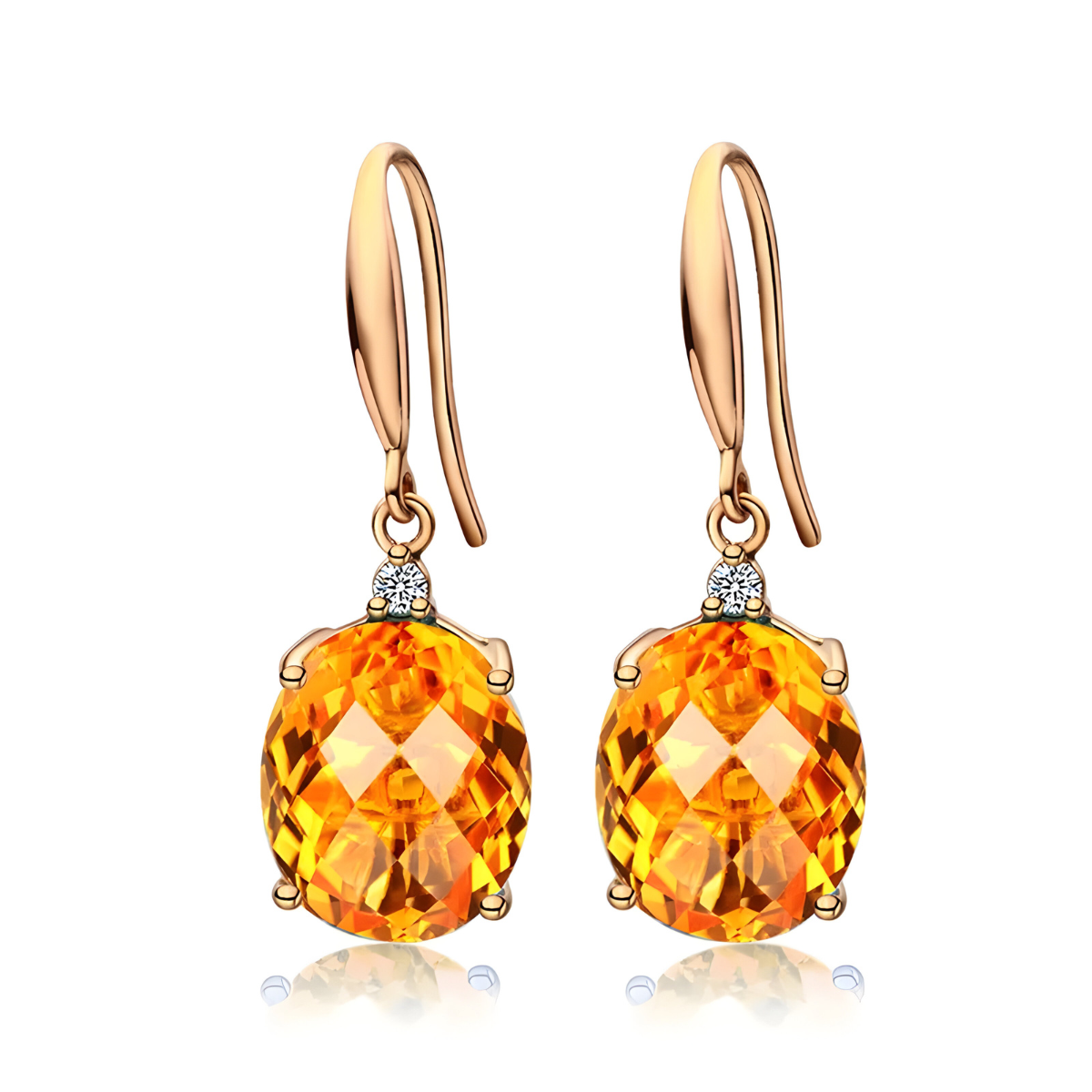 boucle d’oreille citrine ovale facettée montée sur crochet doré avec petit zircon rond serti au sommet