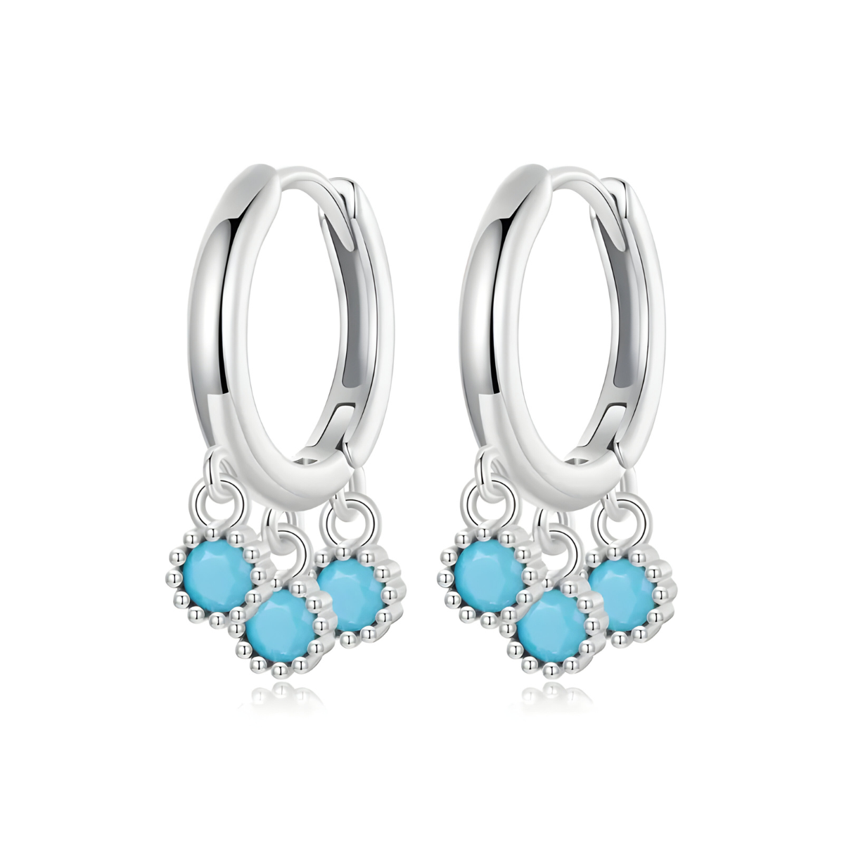 Boucles d’oreilles Turquoise créoles argent 925 ornées de perles turquoise naturelles serties sur monture incurvée finition polie
