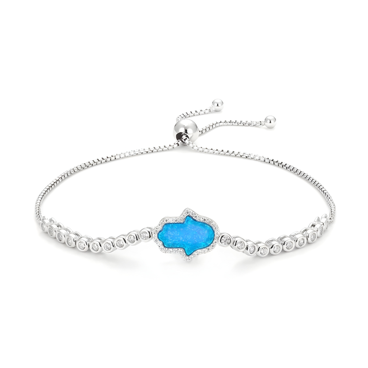 Bracelet aigue marine ajustable avec chaîne argentée et pierre centrale bleu vif en forme de main entourée de petits cercles brillants