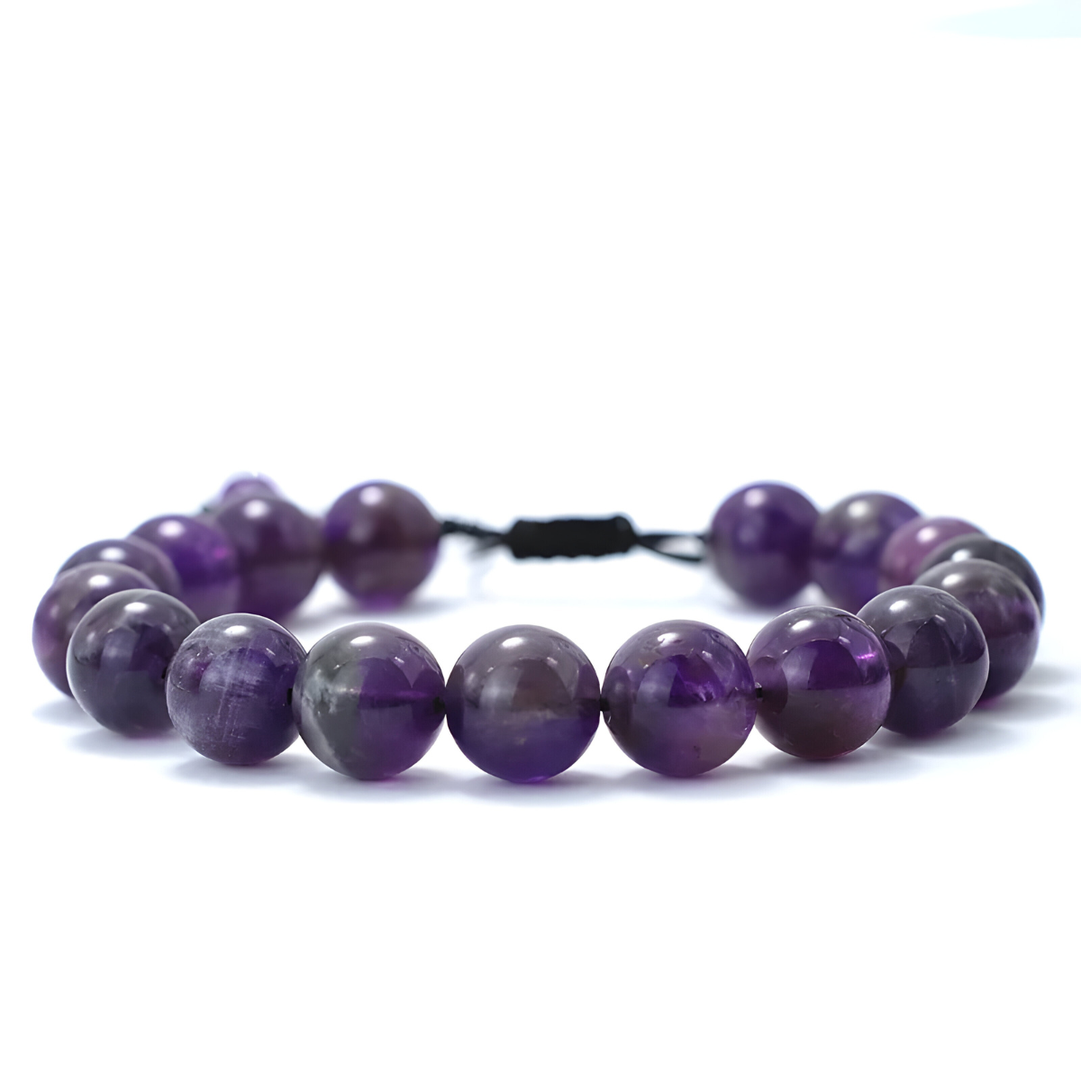 bracelet améthyste avec perles rondes violettes monté sur cordon noir ajustable