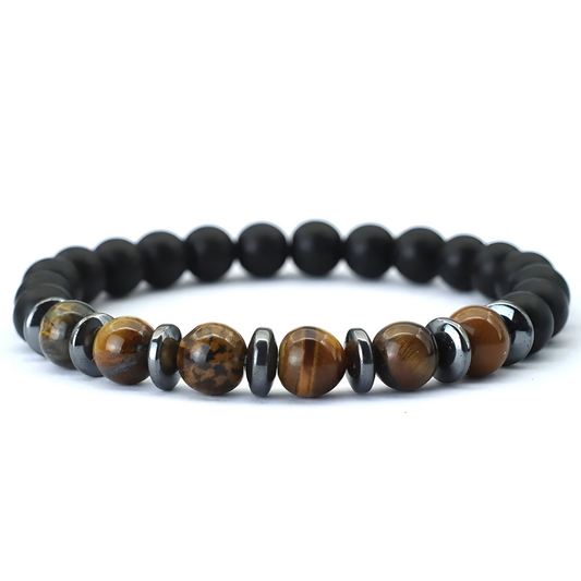 Bracelet oeil de tigre avec perles marron veinées, disques noirs brillants et perles noires mates montées sur fil élastique