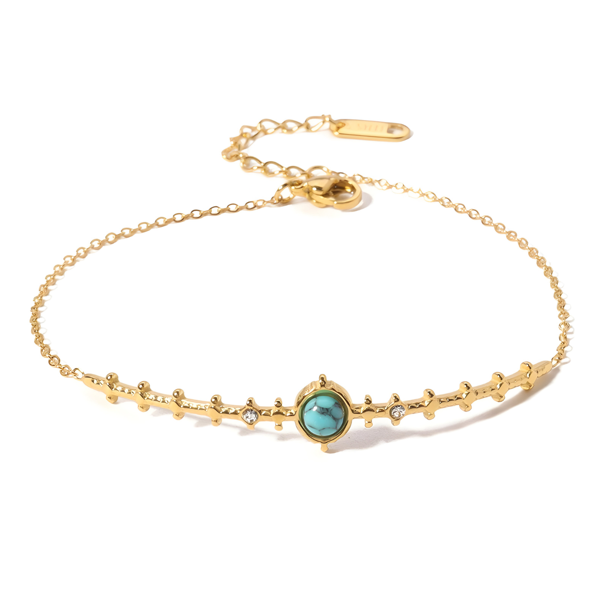 bracelet turquoise fin en chaîne dorée avec une pierre ronde bleu marbré sertie au centre et petits détails en perles dorées et cristaux