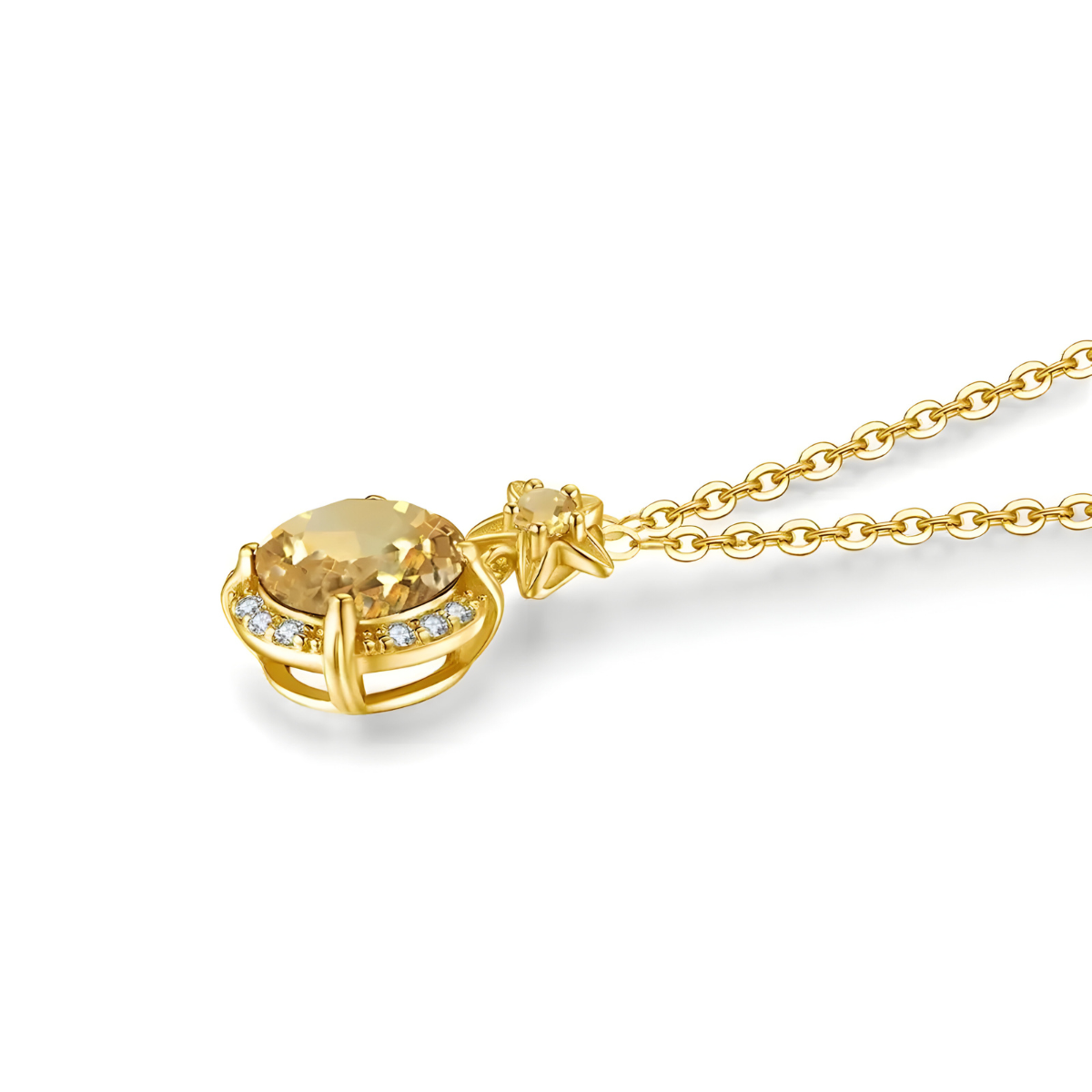 Gros plan sur un pendentif étoile en or serti d’une petite citrine facettée fixé à une fine chaîne, collier Citrine minimaliste