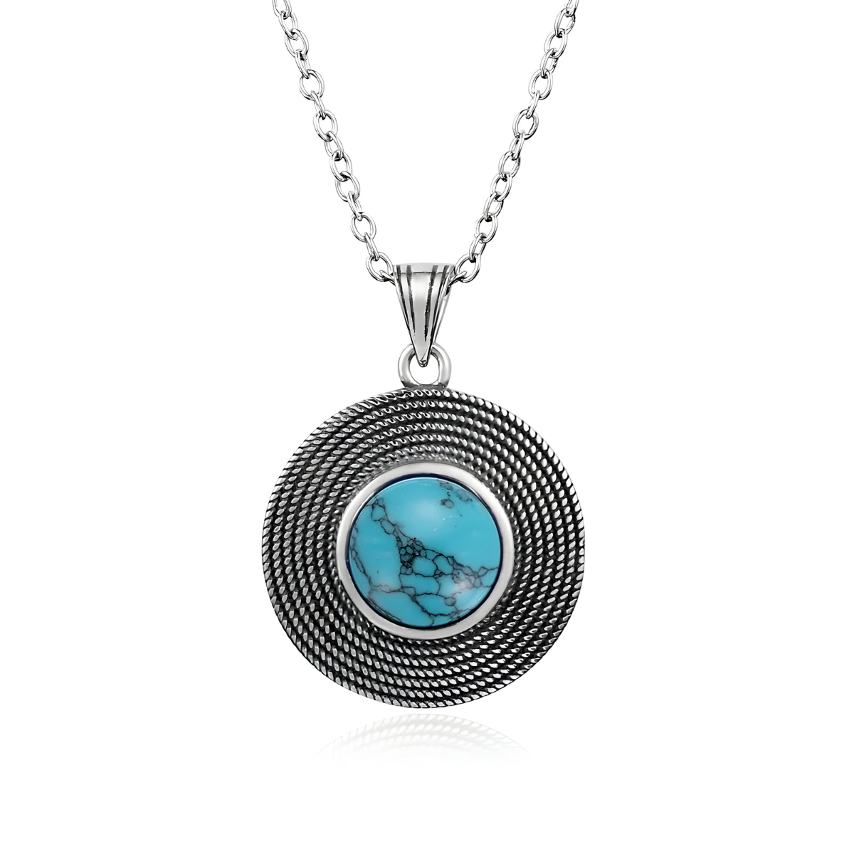 Un Collier Turquoise Ethnique en argent, doté d’un pendentif rond texturé et d’une pierre turquoise veinée au centre