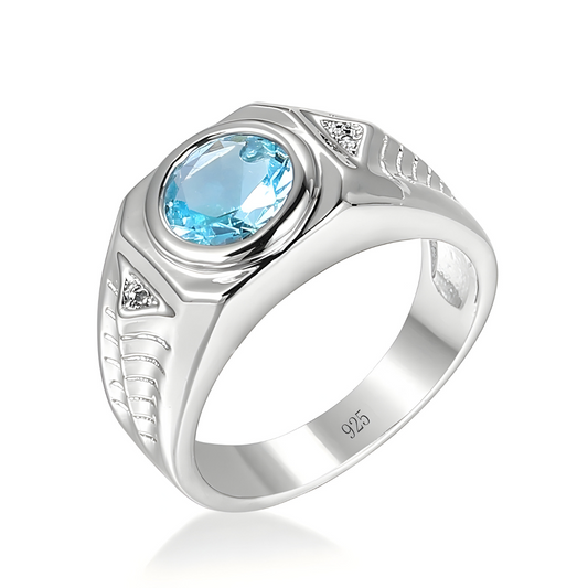 bague aigue marine vintage en argent massif avec pierre ovale bleue sertie et gravures latérales