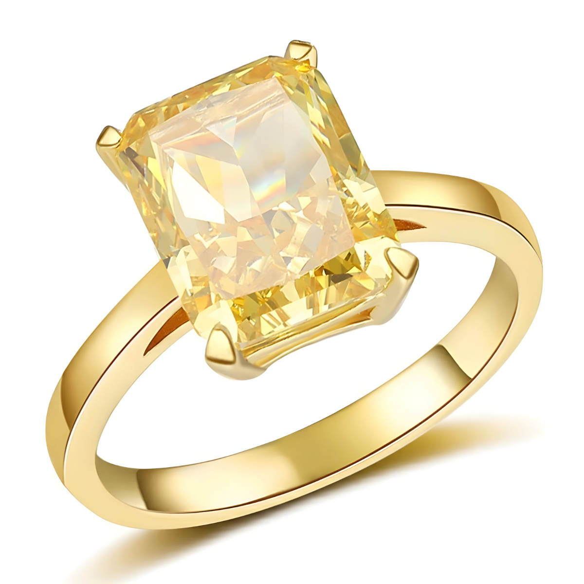 bague citrine or avec pierre rectangulaire jaune taillée émeraude sur monture dorée