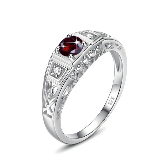 bague grenat argent avec pierre ronde grenat rouge et détails ajourés sur un anneau fin en argent 925