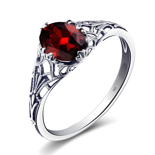 bague grenat argent vue intérieure avec monture ajourée et pierre cœur rouge