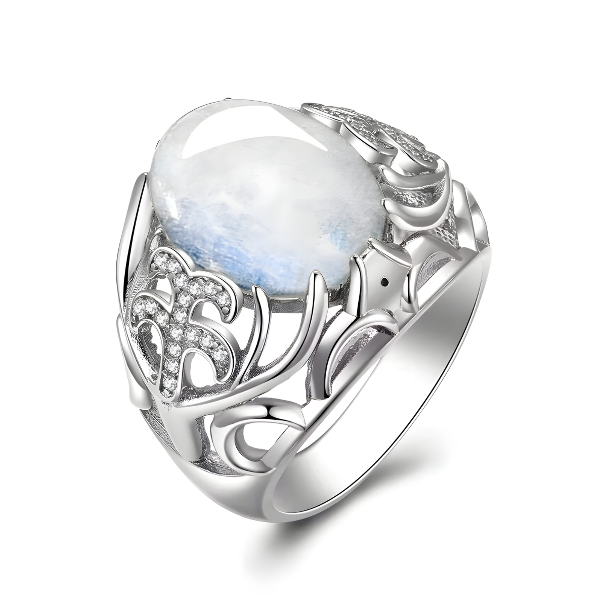 Bague pierre de lune bella ovale cabochon montée sur anneau argenté ajouré avec motifs floraux incrustés de petits oxydes
