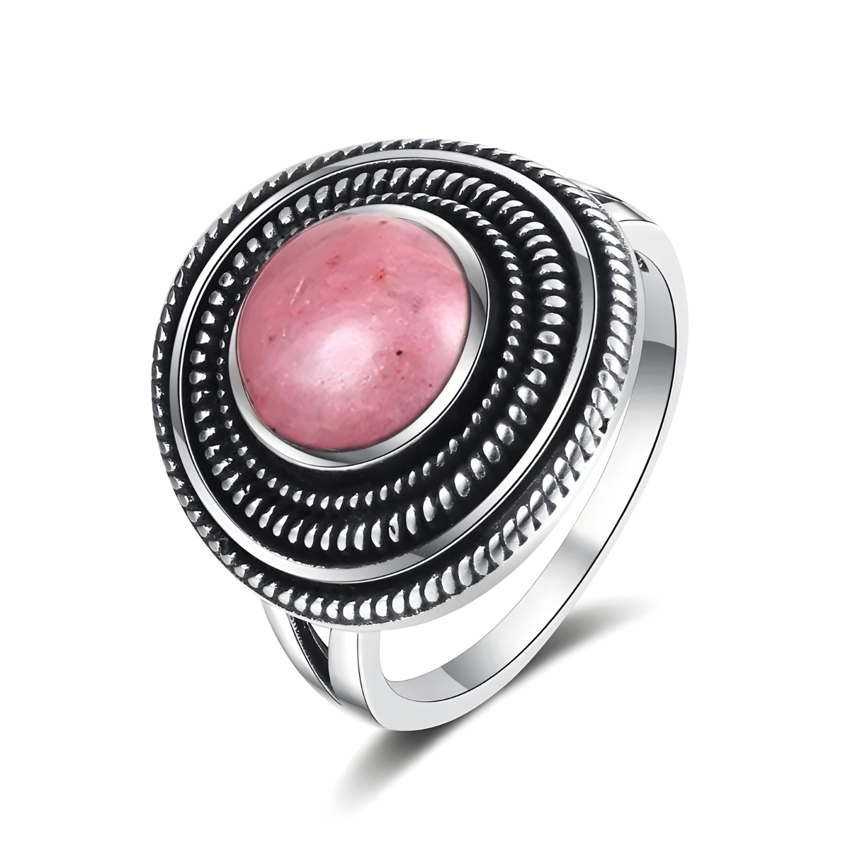 Bague rhodochrosite ronde rose montée sur anneau argenté avec monture circulaire décorée d’anneaux perlés en relief