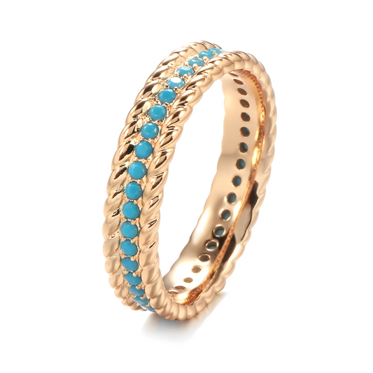Bague turquoise or avec anneau doré torsadé serti d’une rangée de petites pierres rondes turquoise au centre sur toute la circonférence
