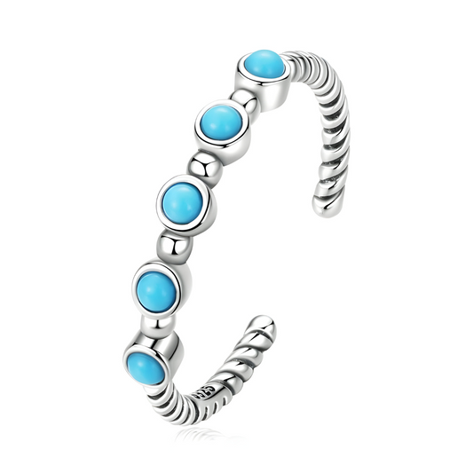 Bague turquoise boulonnaise en argent 925 ouverte et torsadée ornée de six cabochons ronds bleu turquoise sertis sur des supports ovales