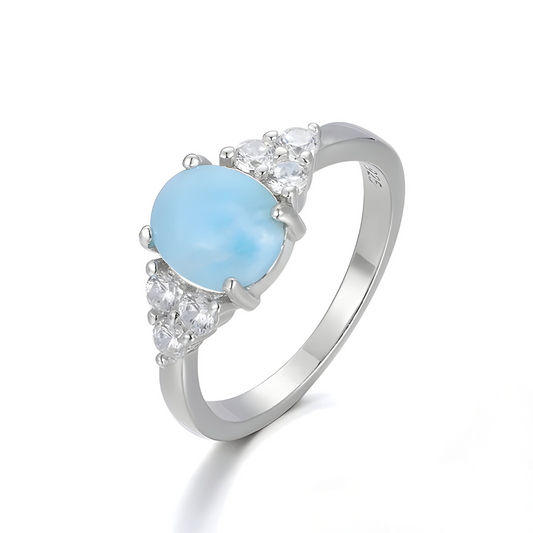 bague aigue marine brute en argent 925 avec pierre ovale polie et oxydes de zirconium