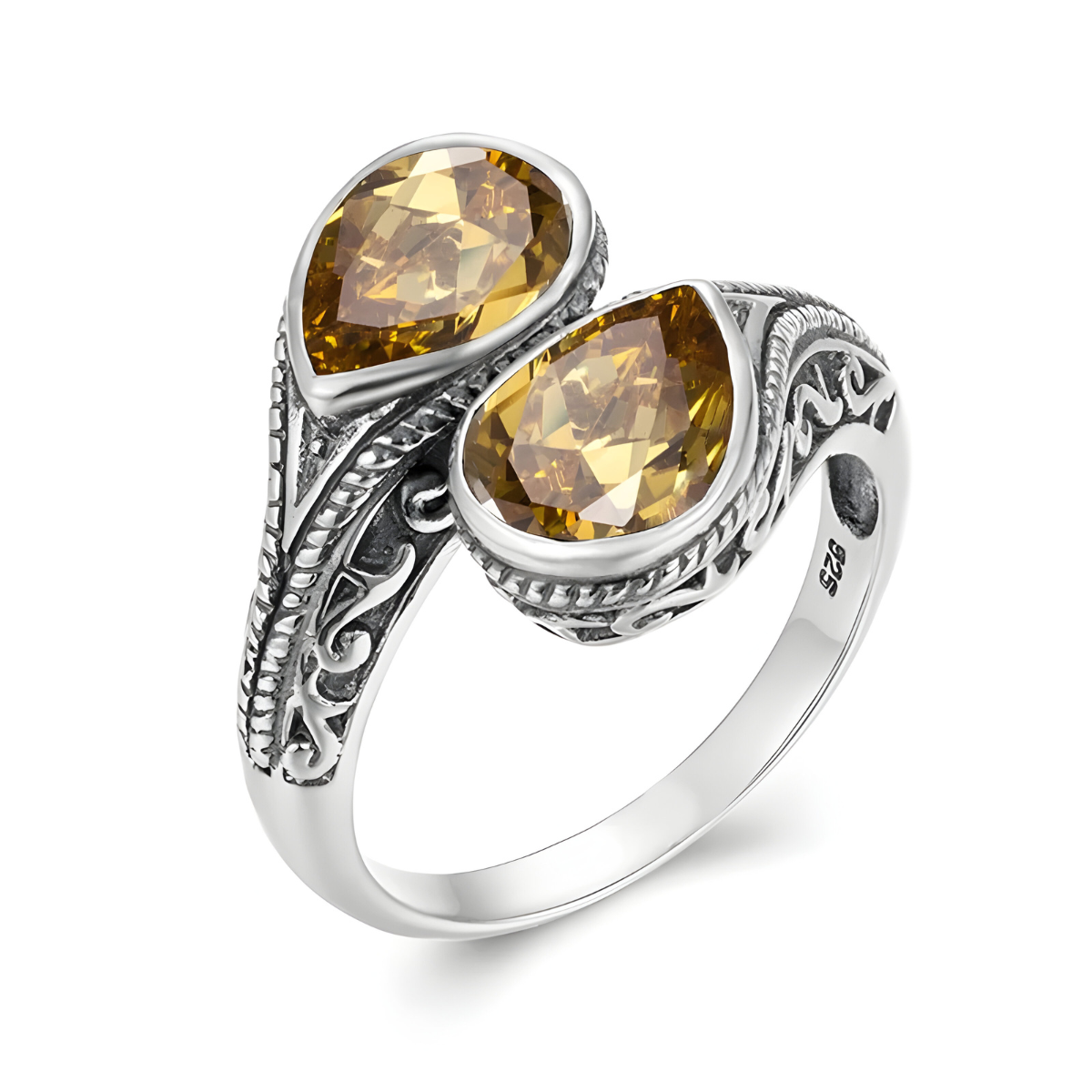 bague citrine naturelle avec deux pierres jaune facettées en forme de goutte serties sur un anneau argenté gravé