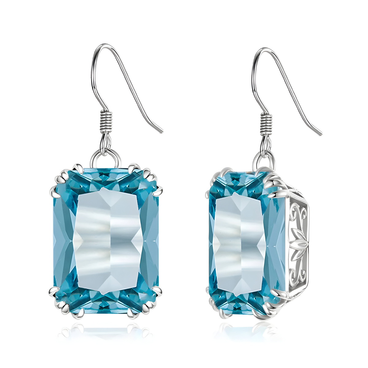 Boucles d’oreilles aigue marine rectangulaires facettées montées sur griffes argentées avec crochet et monture ajourée décorative