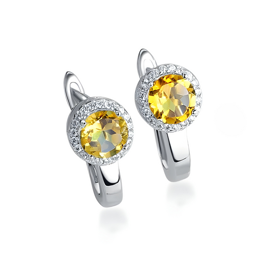 Boucles d’oreilles en argent serties de citrines rondes facettées, entourées d’un halo de pierres claires pour un éclat raffiné et lumineux