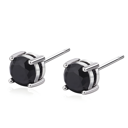 Boucles d’oreilles obsidienne avec pierre noire ronde facettée montée en clou sur une monture argentée à quatre griffes épaisses