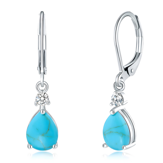 Boucles d’oreilles Turquoise pendantes en argent 925 ornées de pierre naturelle turquoise bleu ciel en forme de goutte sertie sur monture ajourée style vintage