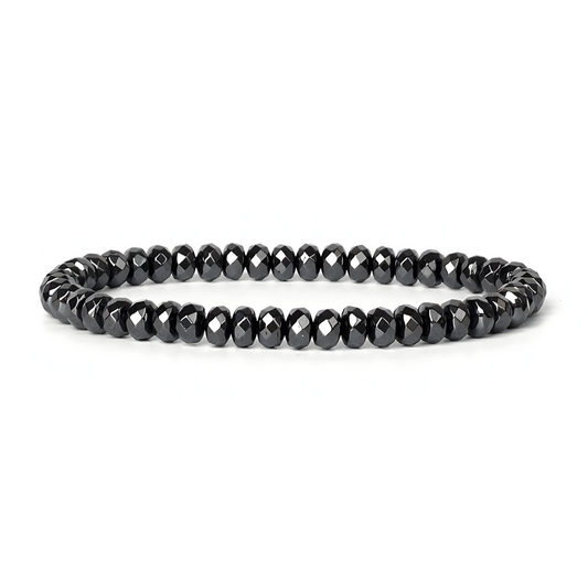 bracelet hématite avec perles cylindriques plates noir métallisé montées sur un fil élastique invisible