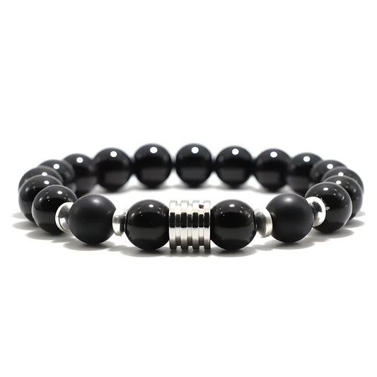 bracelet obsidienne avec perles noires brillantes et mates, séparateur central en métal argenté strié et intercalaires métalliques argentés