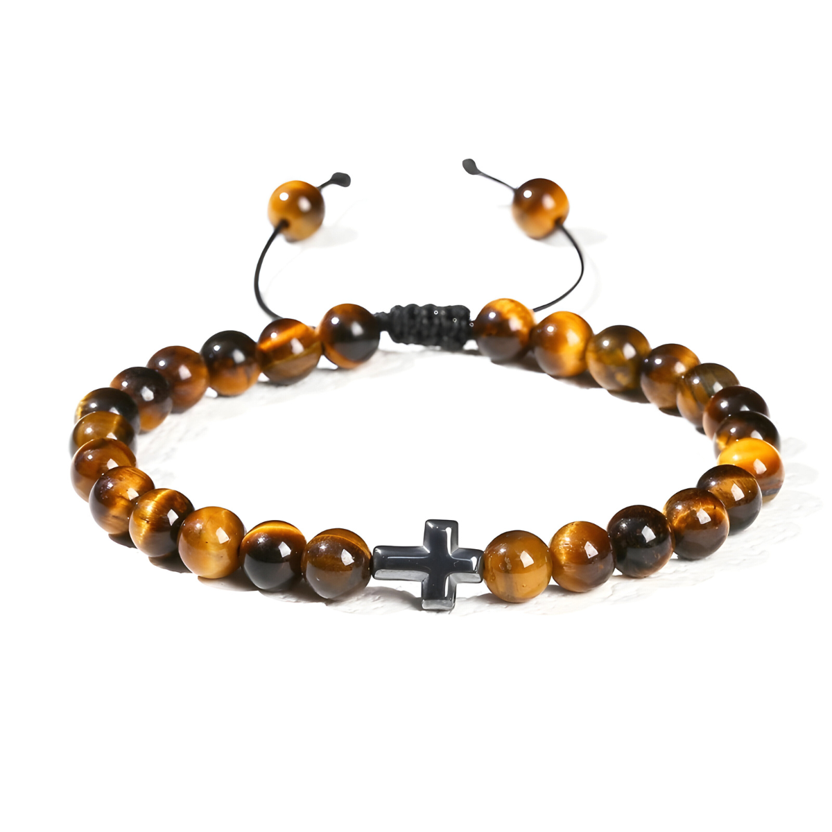 Bracelet œil de tigre avec perles rondes et croix noire monté sur cordon ajustable