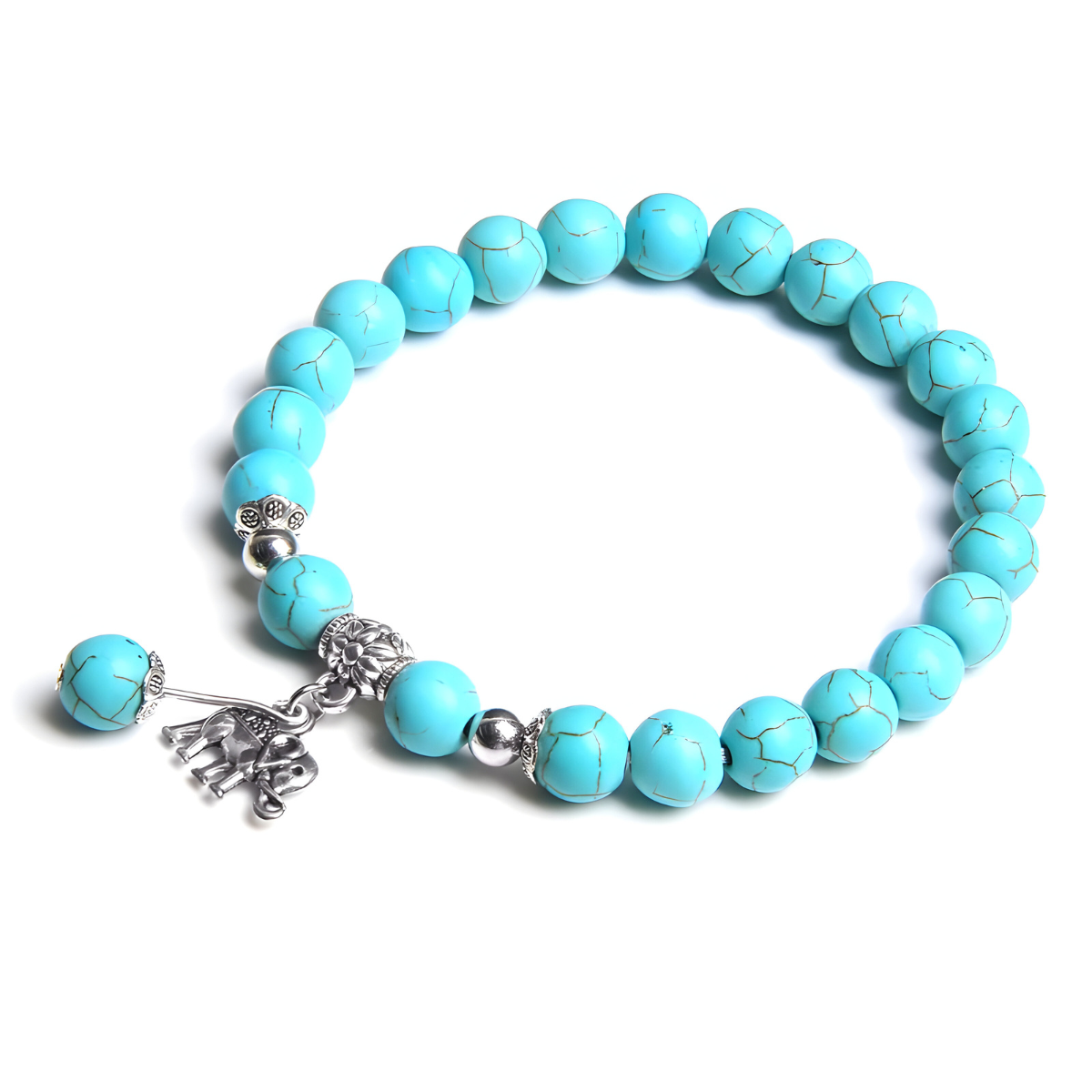Bracelet turquoise avec perles marbrées et breloque éléphant argentée monté sur fil élastique