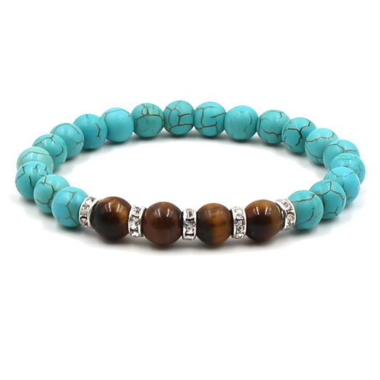 bracelet turquoise composé de perles bleu clair avec cinq perles marron effet œil de tigre séparées par des anneaux argentés à strass