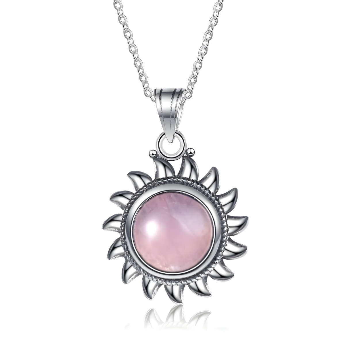 Un Collier Quartz Rose Argent, orné d’un pendentif en forme de soleil et d’une pierre rose ronde