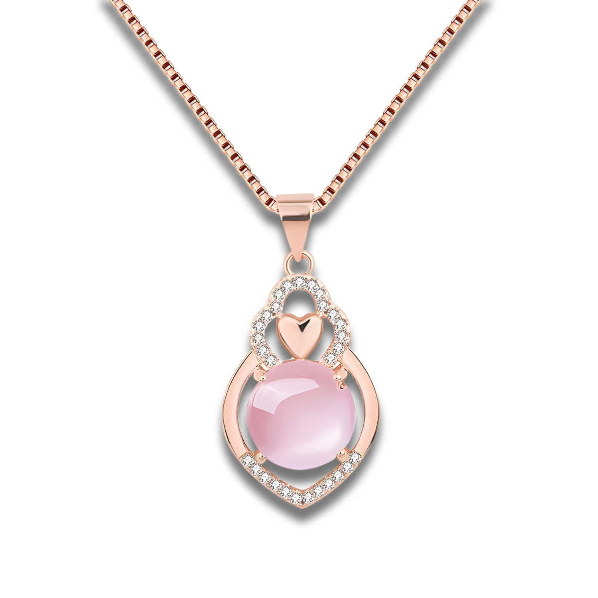 Un Collier Quartz Rose Or en or rose, orné d’une pierre rose sphérique et d’un motif ajouré en forme de cœur serti de petits cristaux