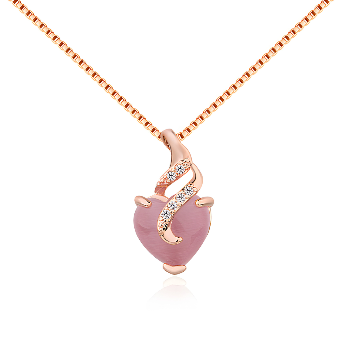 Un Collier Quartz en or rose, orné d’un pendentif en forme de cœur rose et d’un motif ondulé serti de petits cristaux