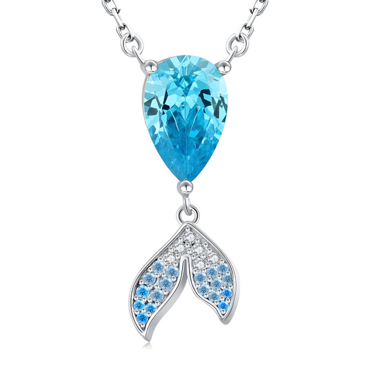 Collier Aigue Marine Argent avec pierre bleue goutte en aigue-marine, accompagné d’un pendentif queue de sirène avec cristaux blancs et bleus