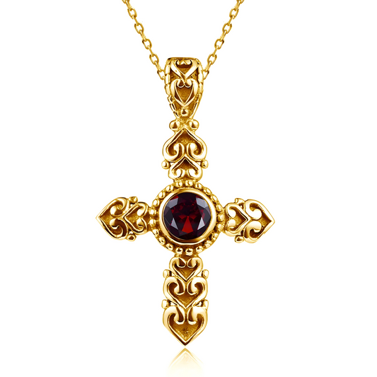 Un collier Grenat en or, avec un pendentif en forme de croix orné de motifs baroques et d’une pierre rouge ronde au centre